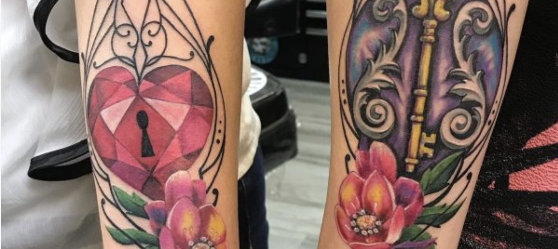 Tattoo touch-ups on two forearms